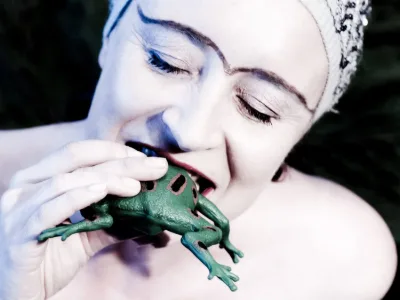 Eating the green frog!